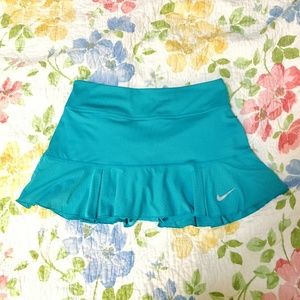 Nike, teal dri-fit skorts, pleated skirt